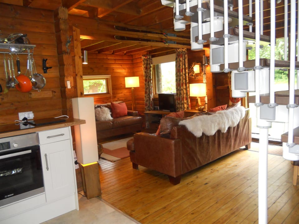 Ground floor is a spacious open plan kitchen, lounge and dining area