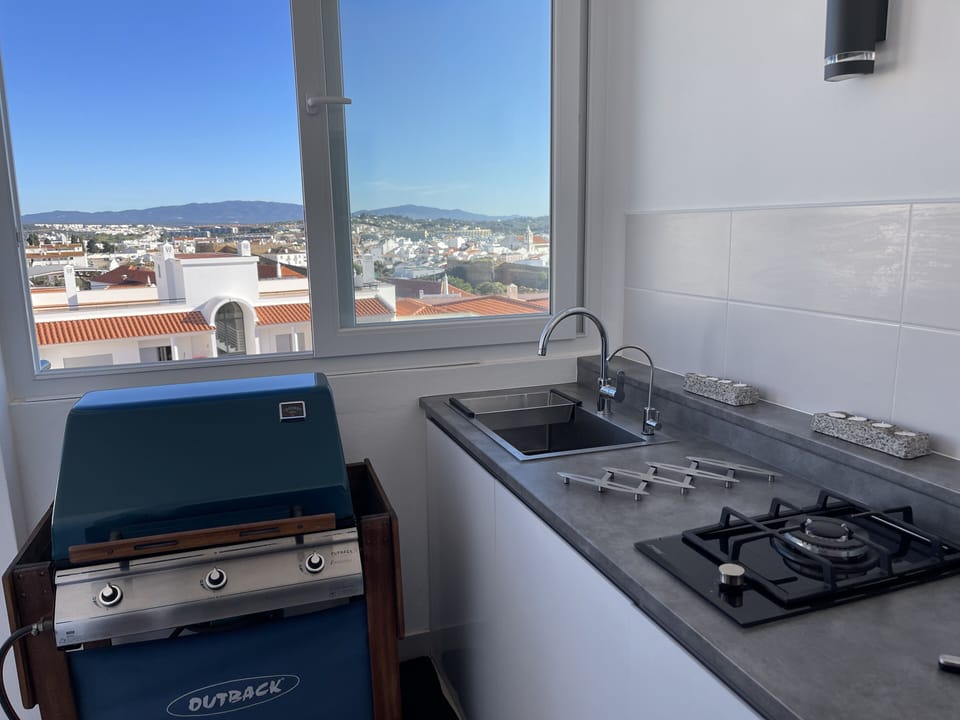 Sliding windows, plus open on to main balcony, enjoy cooking alfresco!