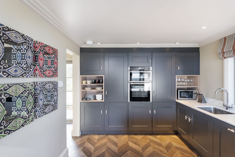 Kitchen with coffee machine, oven and hob, toaster, kettle & dishwasher - Beam Ends