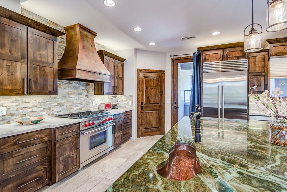 Gourmet Kitchen with Stainless Steel Appliances and Granite Countertops
