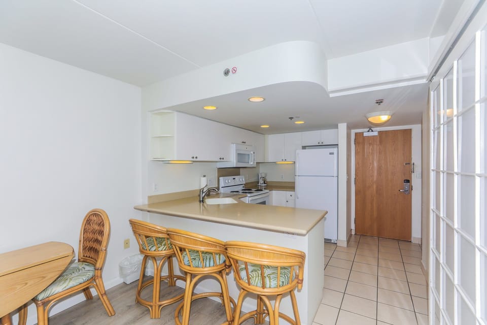 Bar seating and a dining table for 2
