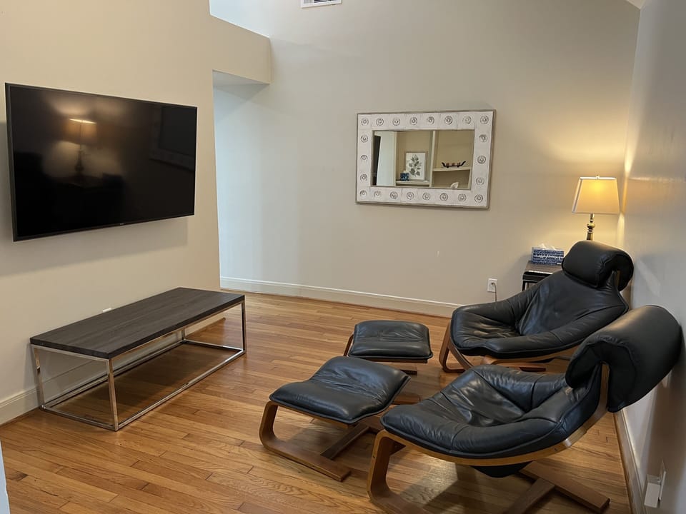 As you enter the house, you will come in to this front room with Smart TV.