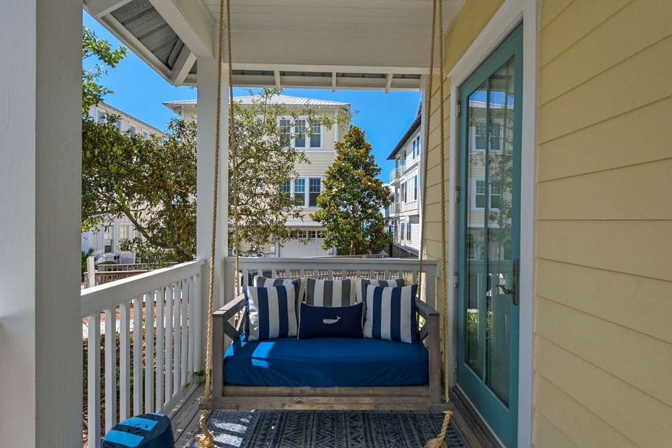 Enjoy your morning coffee on the porch swing