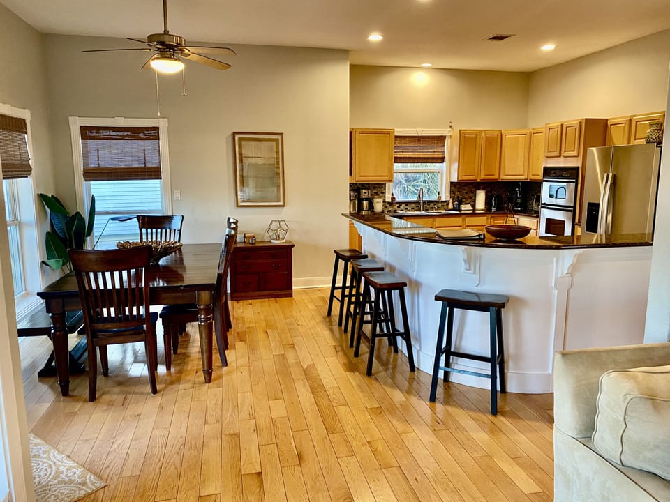 The table seats 8 & bar stools for 4, so gather around and savor meals together.