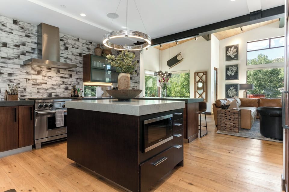 Gather everyone around kitchen island to help prepare for the
group dinner!