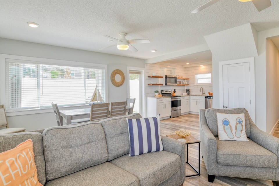 Your private entrance leads to this bright space featuring beachy decor and new furnishings!