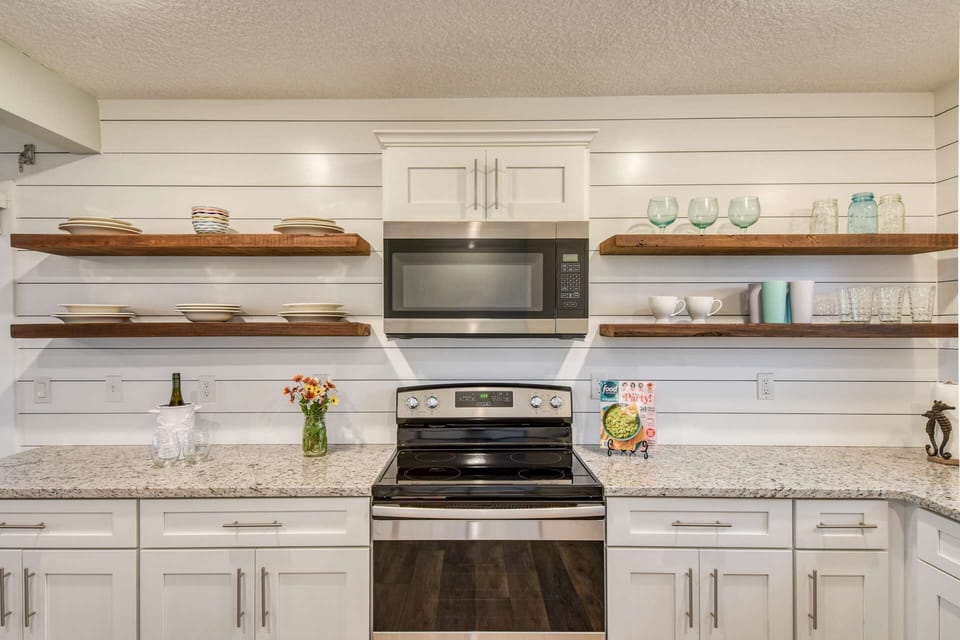 You will enjoy preparing your favorite foods and drinks is this updated kitchen!