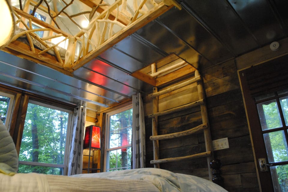 Ladder to loft area of Cedar Treehouse.