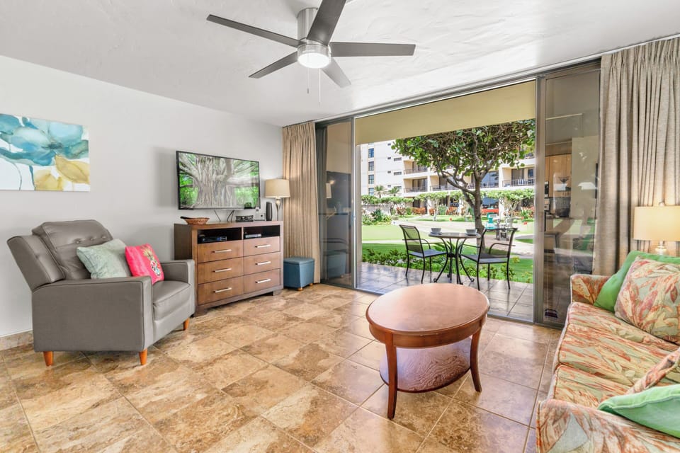 Feel the fresh breeze and natural light in the spacious living room.