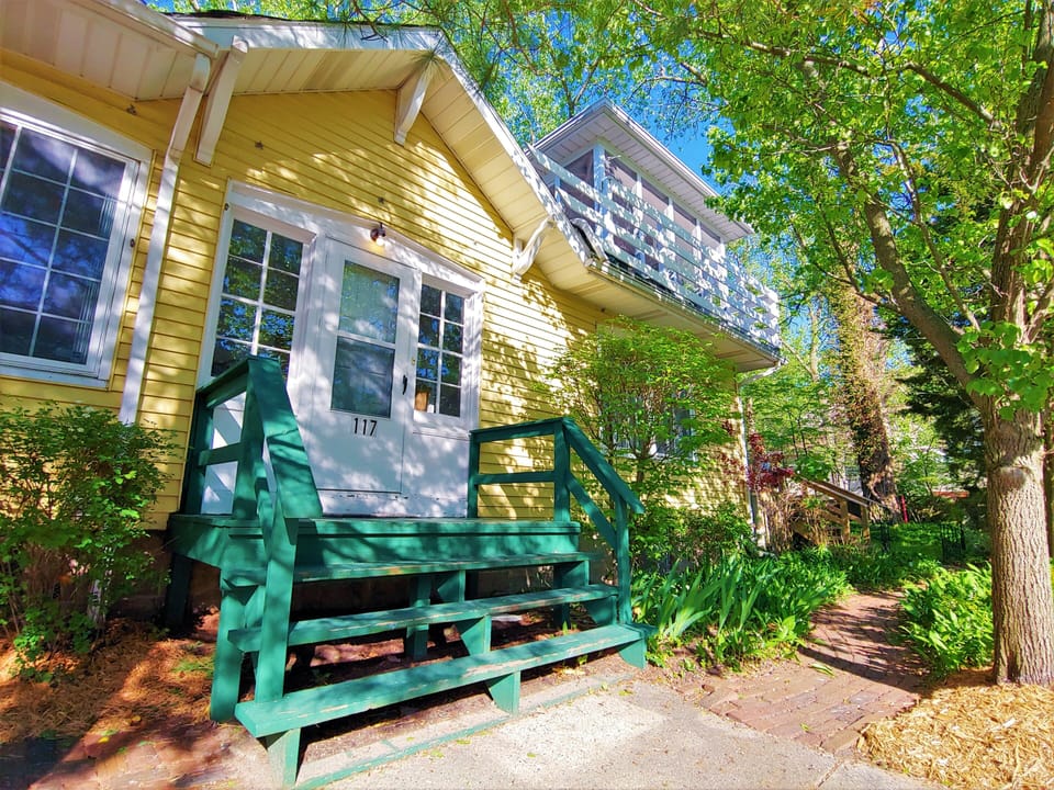 Front entry.  Walkway around to back deck.  View of 2nd floor screened porch.