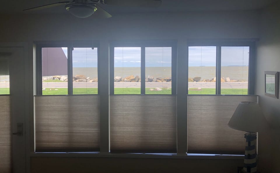 Window treatments are top down bottom up for privacy with a view.