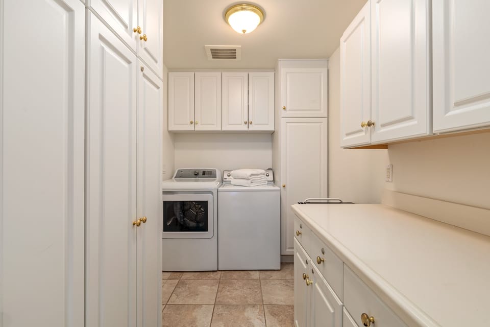 Full size washer and dryer on the first floor.