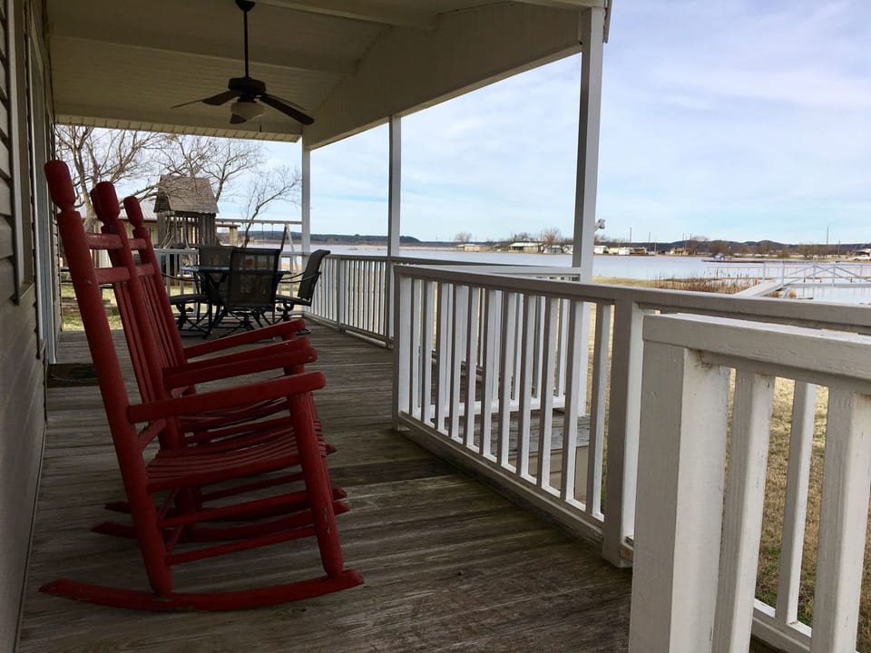 Front porch of the main house facing the water/dock. 