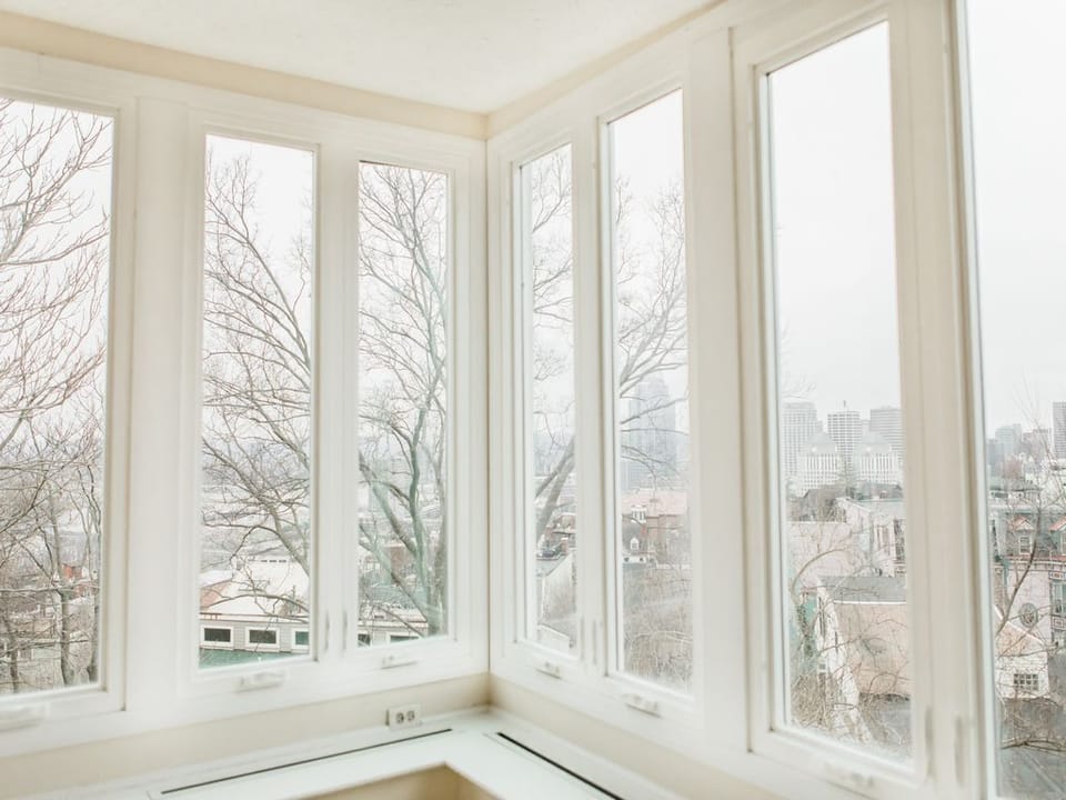 The master bedroom has a full wall of windows!