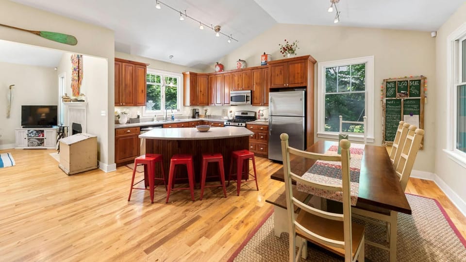 Sunlit kitchen and dining area - open to main living area