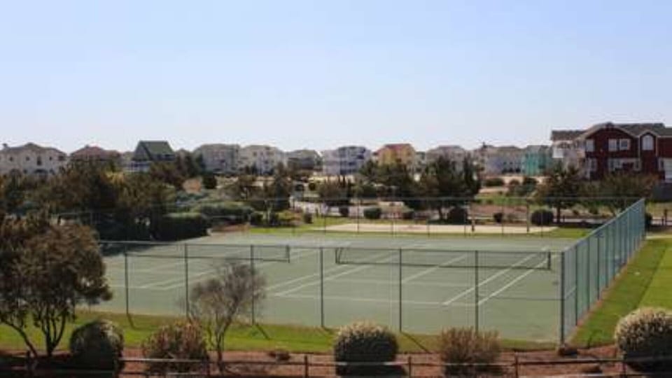 view of tennis courts, playgrounds, and basketball  from upper deck