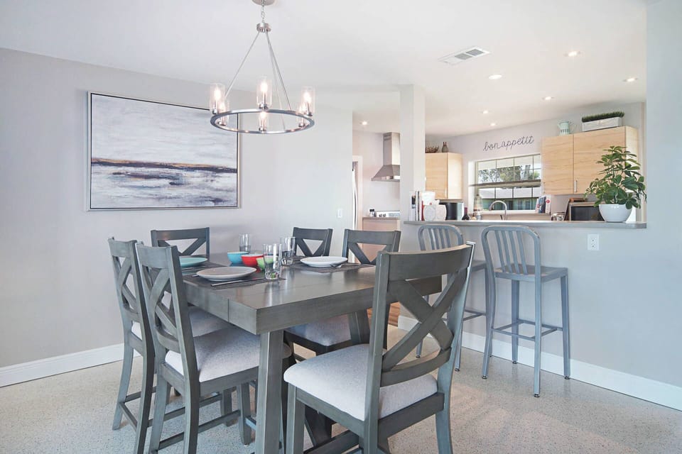 Dining area looking back across island in to kitchen