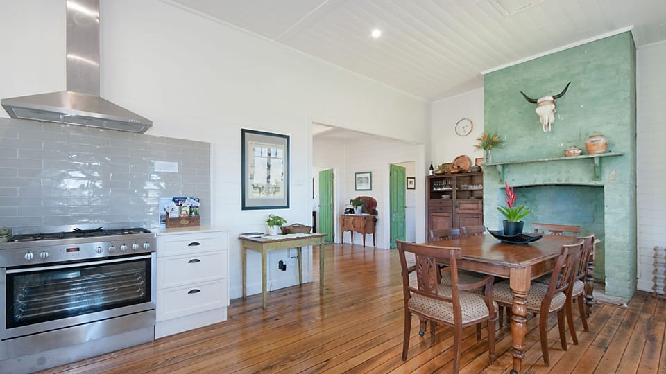 The dining area, now with a big log fire place in our lovely big country kitchen