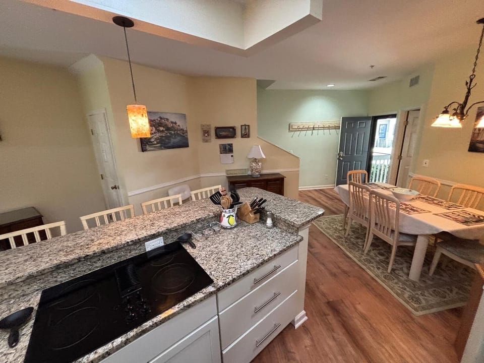 Fully equipped kitchen and dining area.
