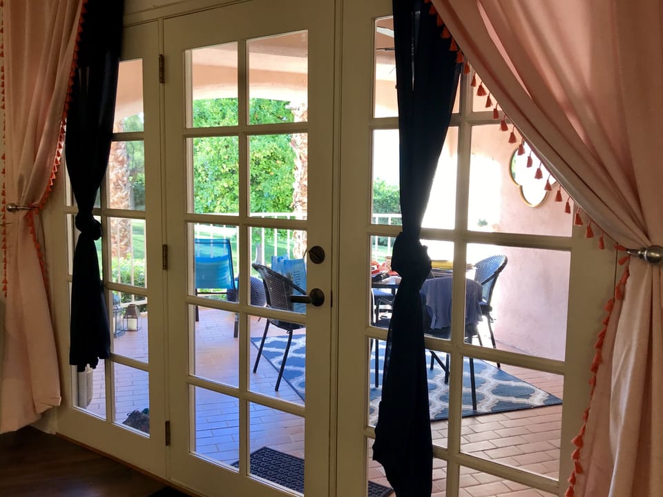 Doors from patio to living room