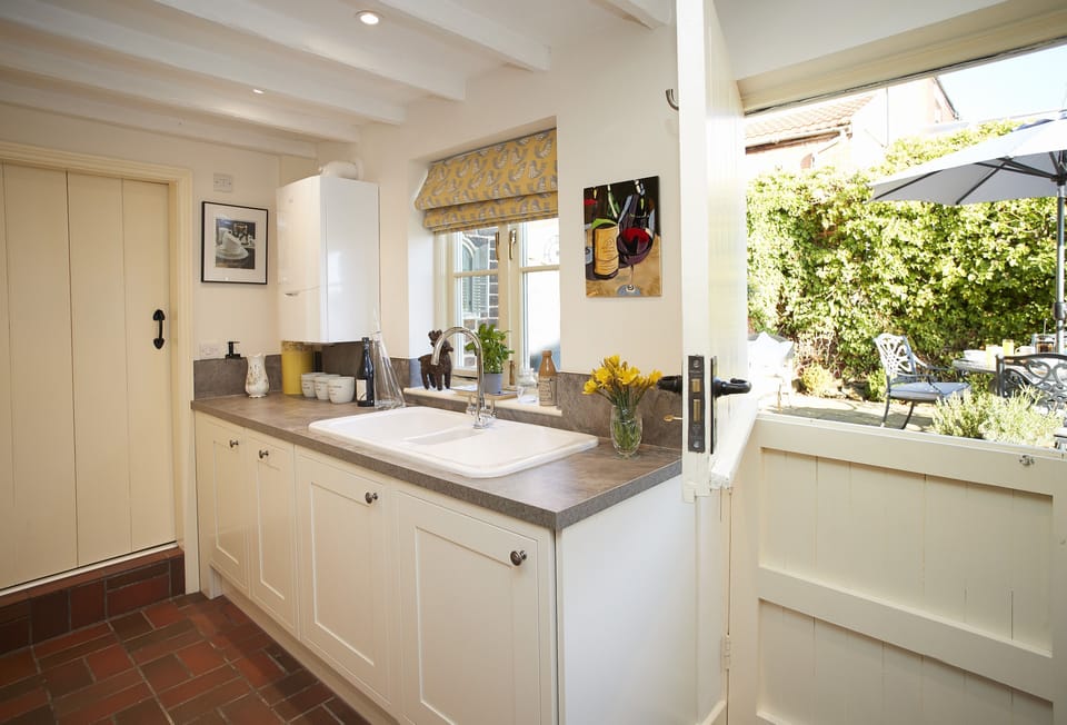 Ground floor: Kitchen looks out onto the quaint back garden