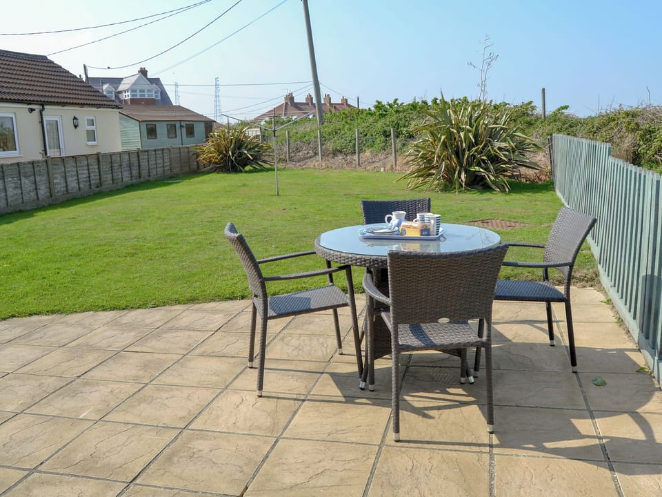 Patio area | Cottage By The Sea, Bacton, near North Walsham