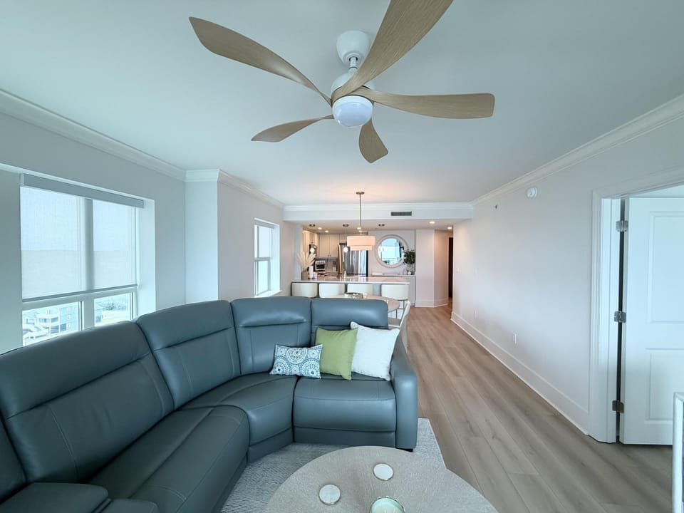 Spacious living room with panoramic windows and modern comfort