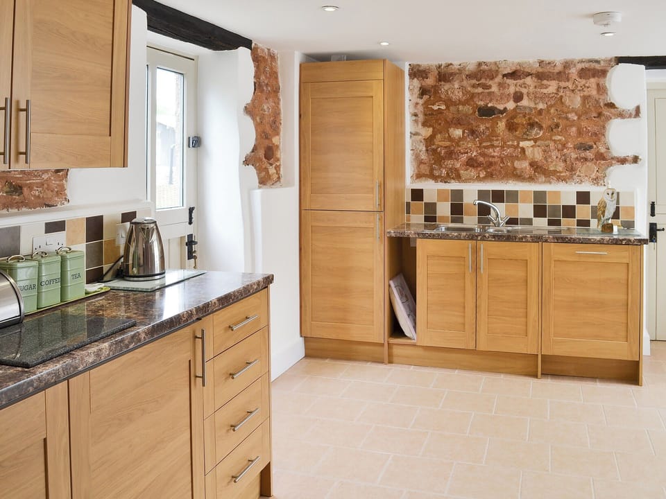Lovely kitchen with exposed brickwork | Fair Maid - Glimsters Farm Holiday let, Kentisbeare, Cullompton