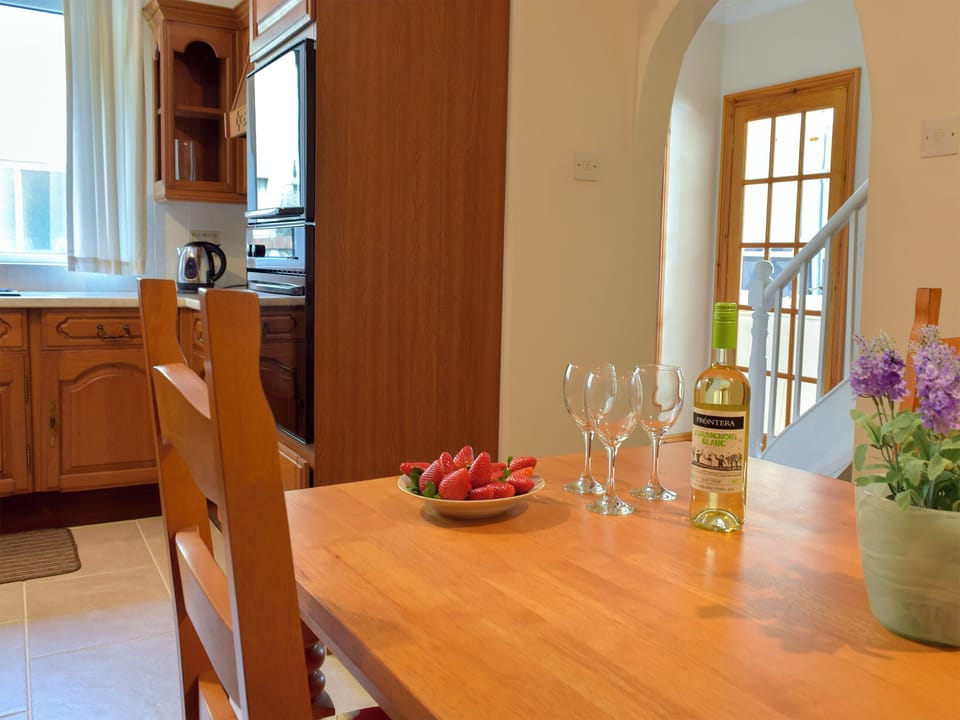 Farmhouse style kitchen with breakfast area | Yorke Villa, Fishguard