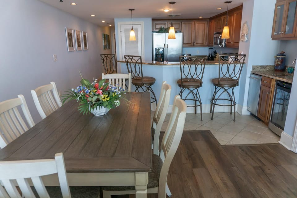 Spacious dining area with cozy kitchen bar seating for gatherings