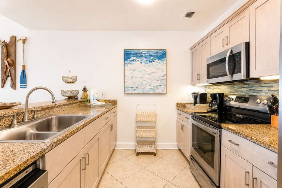 Well equipped kitchen offering a Keurig & drip coffee maker.