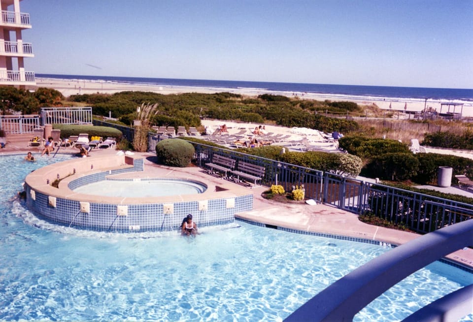 Main pool - a new waterfall is being built over the round baby pool w/seating.