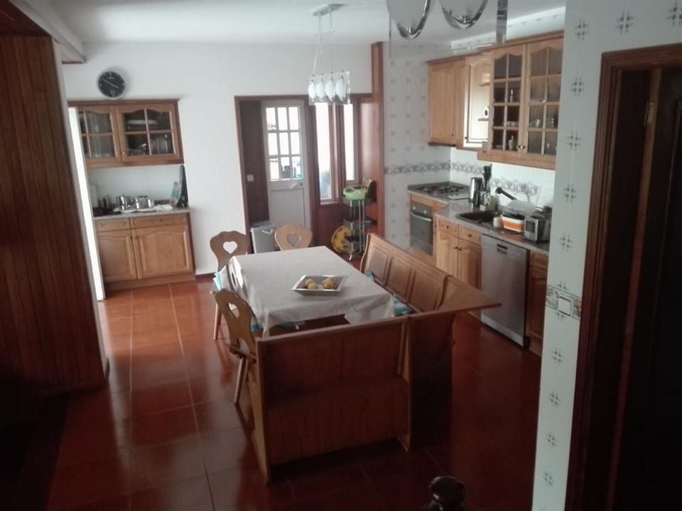 Kitchen and exit to the garden and river outside 