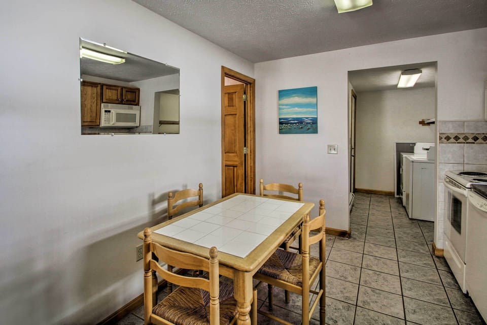Gather together for dinner at the 4-person table.