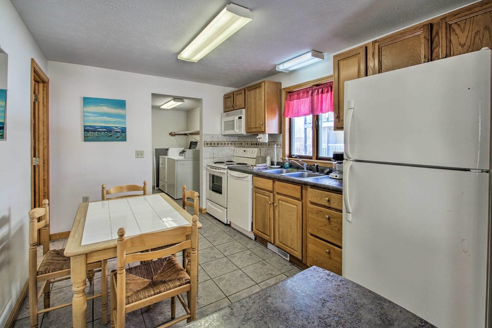 The kitchen comes full equipped with updated appliances.