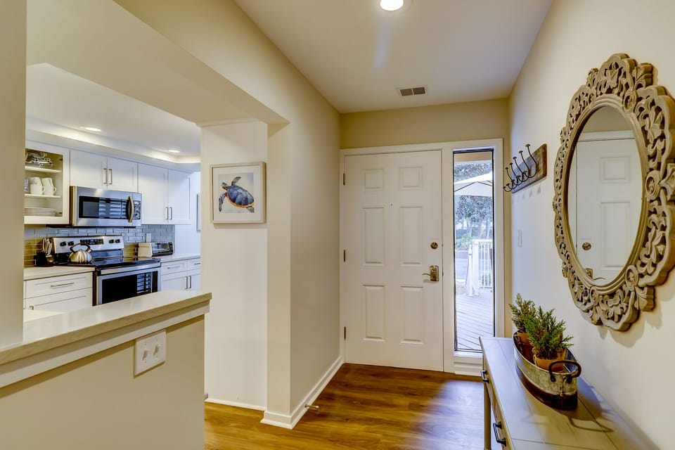 Entry way opening up into kitchen