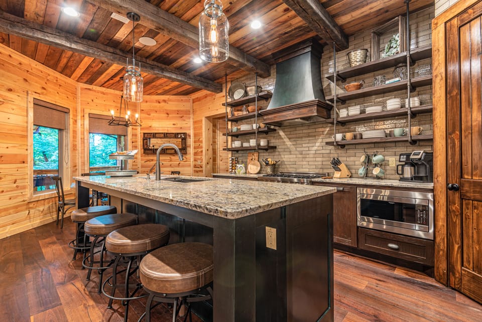 4 additional seats can be found at the bar top.