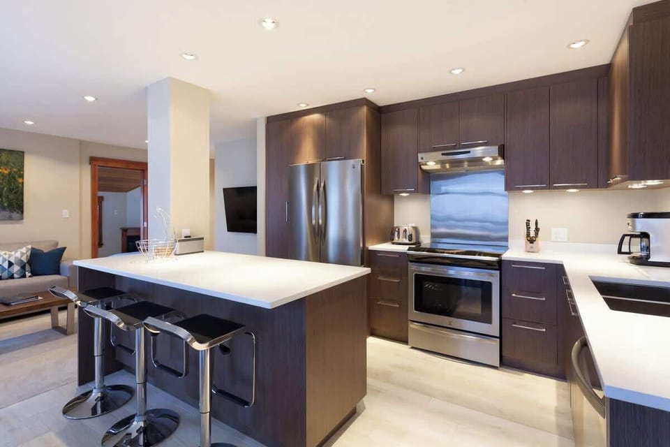 - Fully equipped gourmet kitchen with sleek finishes  
- Stainless steel appliances ideal for family cooking  
- Whistler vacation rental designed for convenience  
