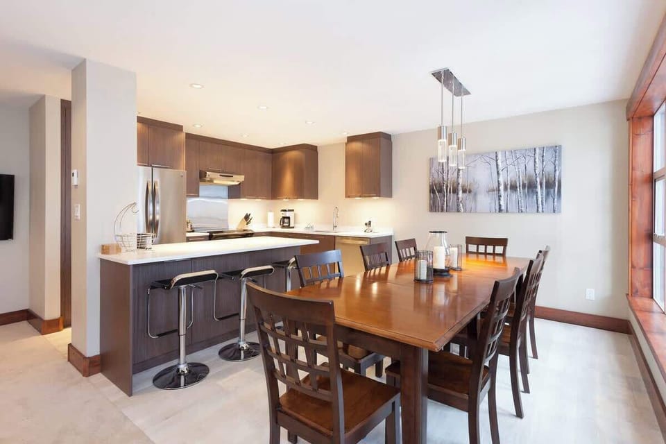 - Bright open layout with dining and modern kitchen  
- Entertain family and friends in mountain luxury  
- Whistler home ideal for memorable group vacations  
