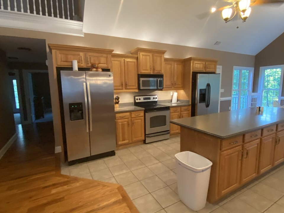 2 Fridges, Microwave, Stove, Oven, 2 Coffee Makers, All Dishes and Cookware inc.