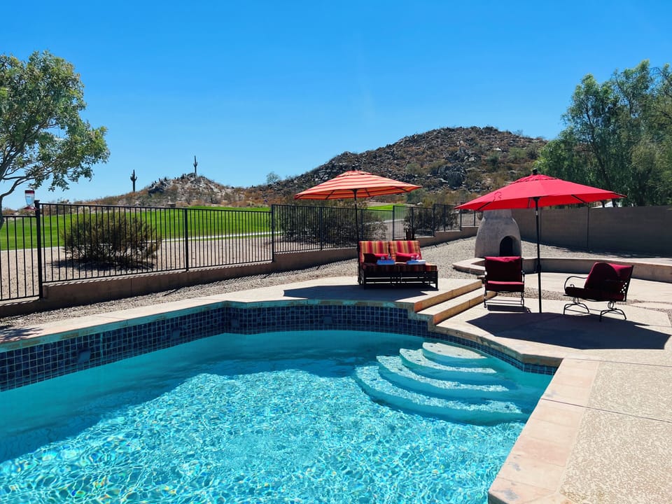 Stunning private backyard pool with south-west views of the 10th hole.