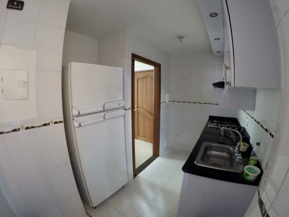 Kitchen with refrigerator