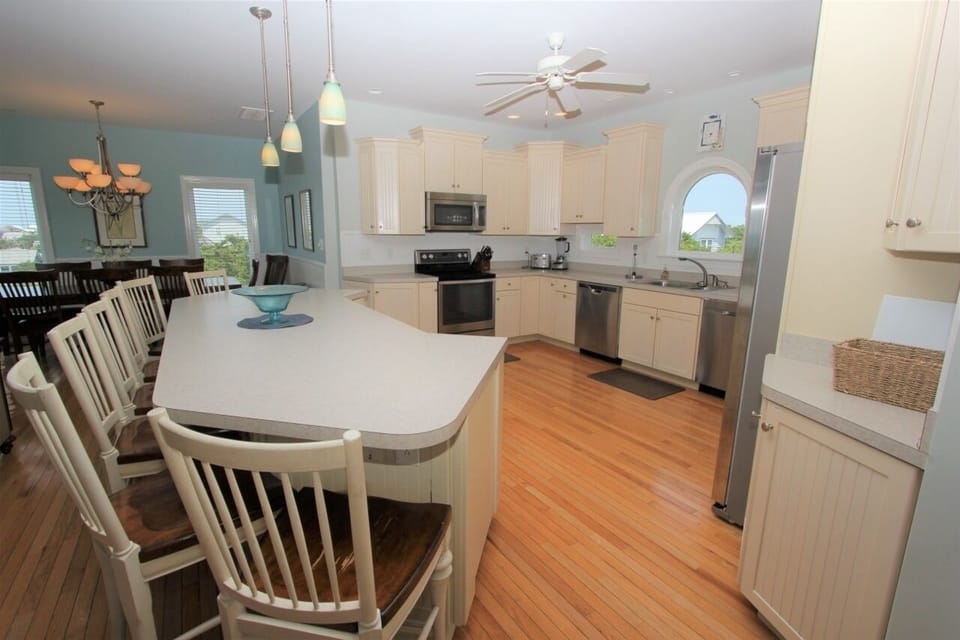 Your spacious kitchen flows seamlessly into dining, perfect for cooking together and sharing meals.
