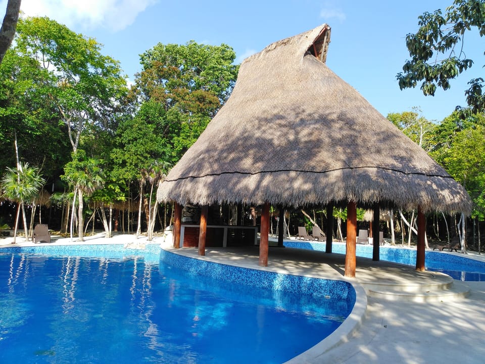 pool in common area of ​​casa paraíso puerto morelos