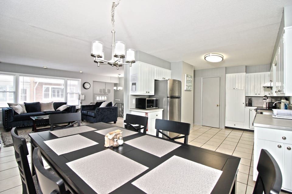 open kitchen that seats 6, flows into living room area