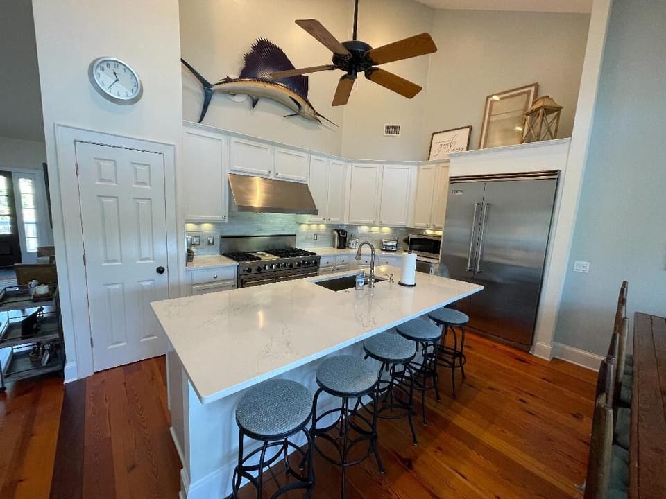 Newly renovated chef's kitchen with top of the line appliances, quartz counters.