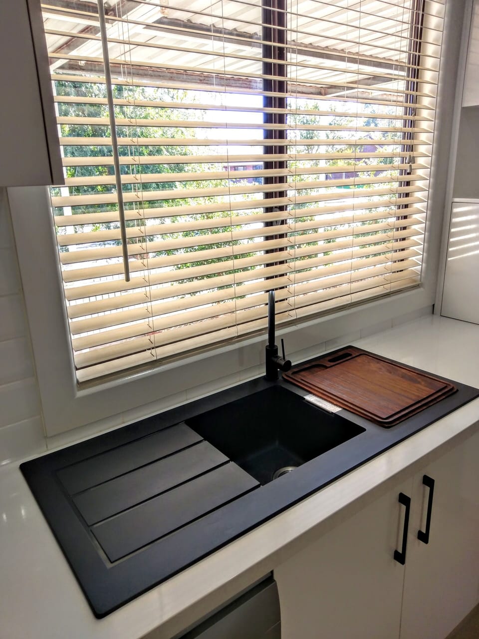 lovely sunlit bench and Sink space