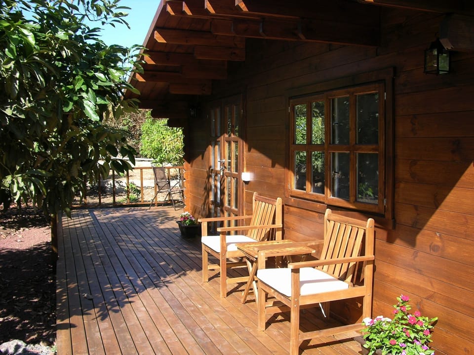 Bougainville. Front porch. A nice spot for reading a book or listen to the birds