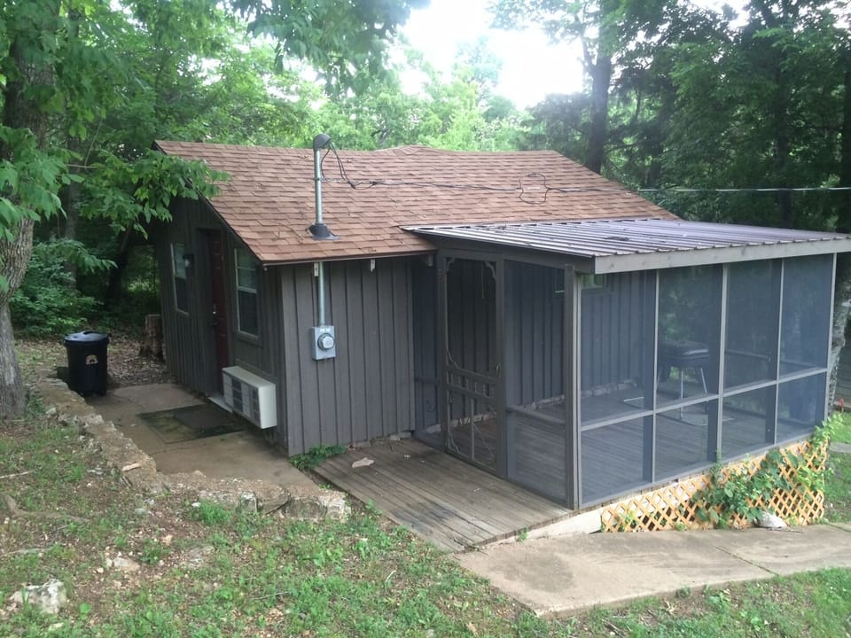 Cabin 30 Cabin entrance with side porch in view