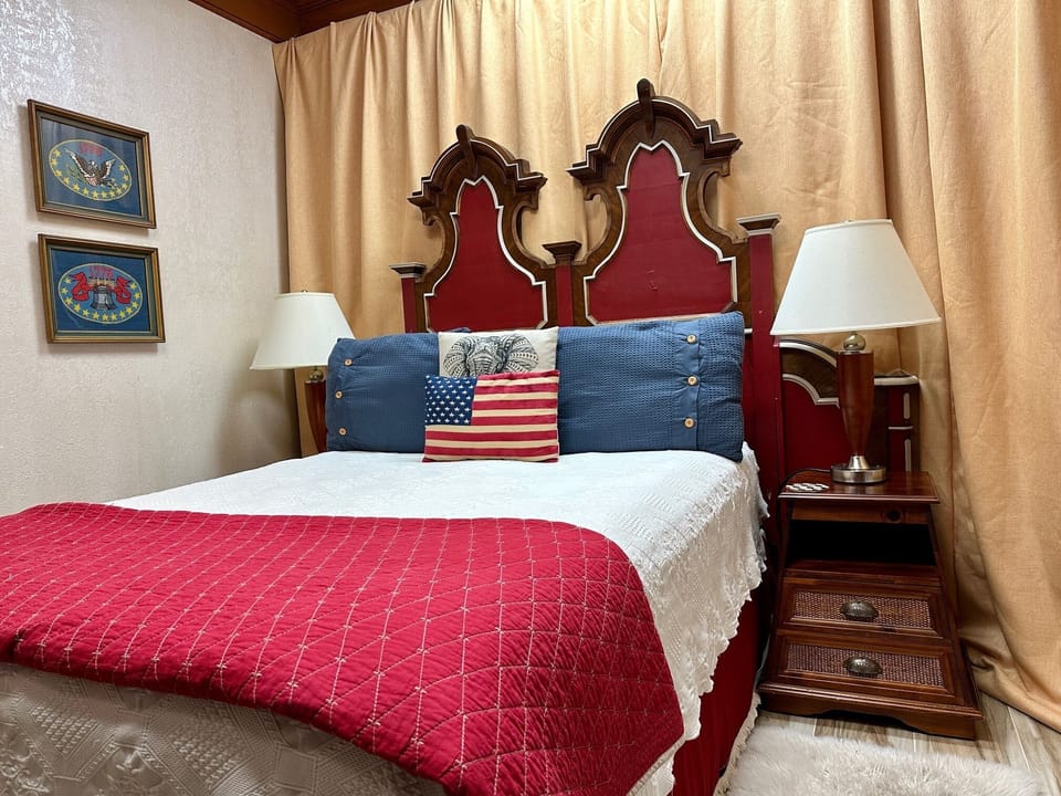 Comfortable Queen Size Bed with Cotton Linens.  Located on 1st floor.